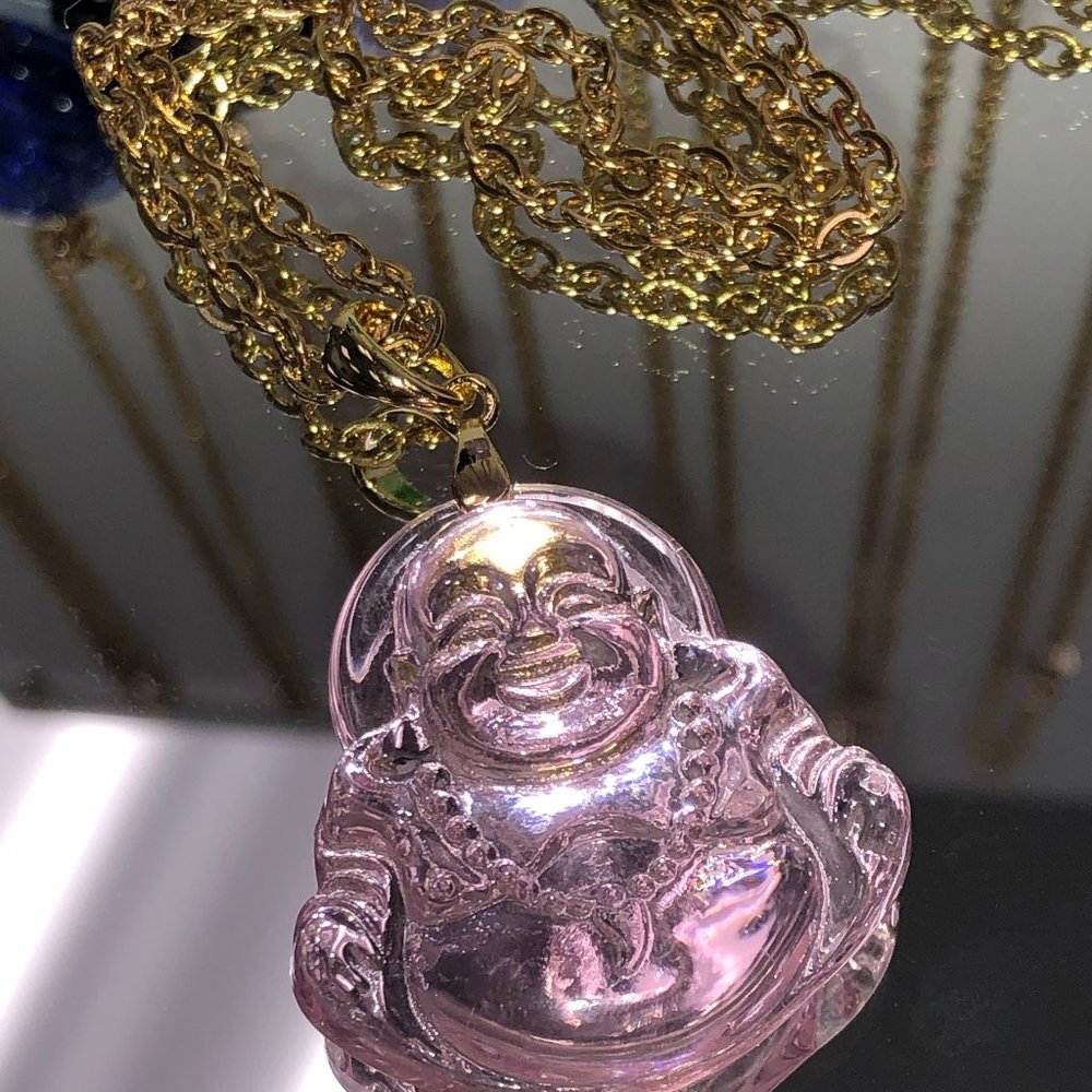 Lucky pink Buddha necklace.